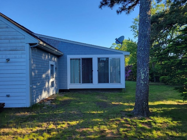 115 Captain Chase Rd, Yarmouth, MA 02664 - rear view of property with a yard