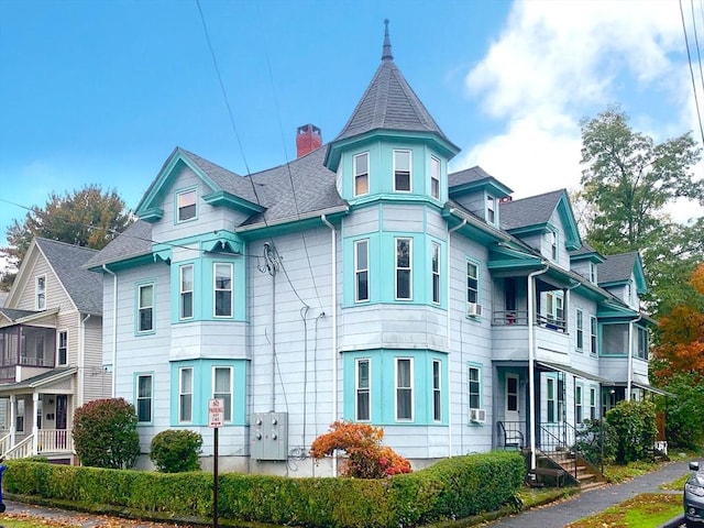 view of front of home with a chimney