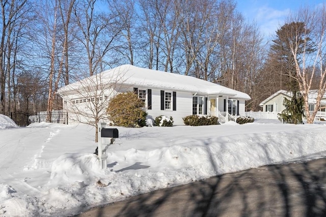 single story home featuring a garage