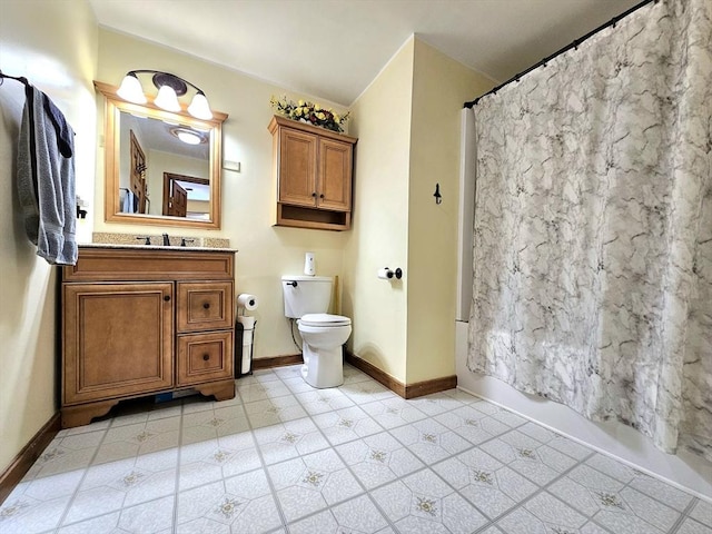 full bathroom with vanity, shower / bathtub combination with curtain, and toilet