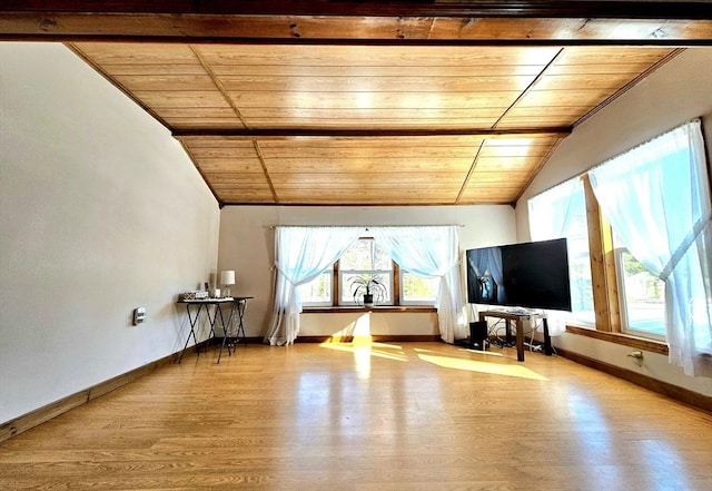 workout area featuring vaulted ceiling, wood ceiling, and light hardwood / wood-style flooring