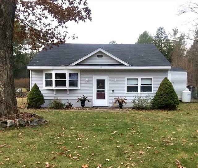 view of front of home with a front yard