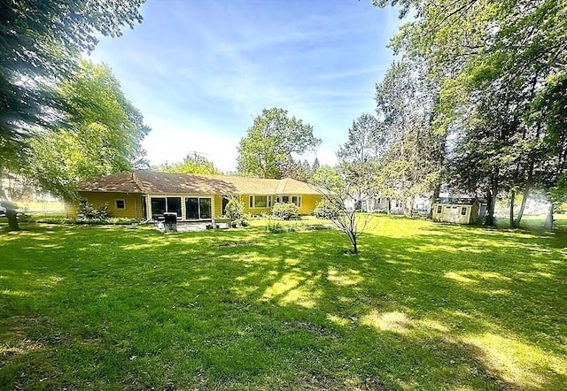 330 Chapin St, Ludlow, MA 01056 - view of grassy yard with a patio area