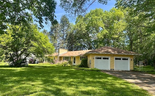 330 Chapin St, Ludlow, MA 01056 - ranch-style home featuring a front lawn and a garage