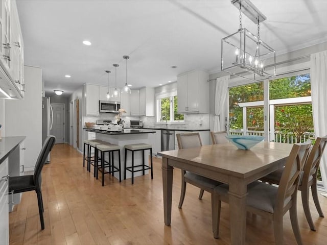 29 Shermans Way, Westwood, MA 02090 - dining area with recessed lighting, a chandelier, and light wood-type flooring