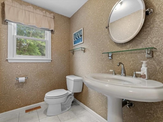 29 Shermans Way, Westwood, MA 02090 - half bathroom with toilet and baseboards