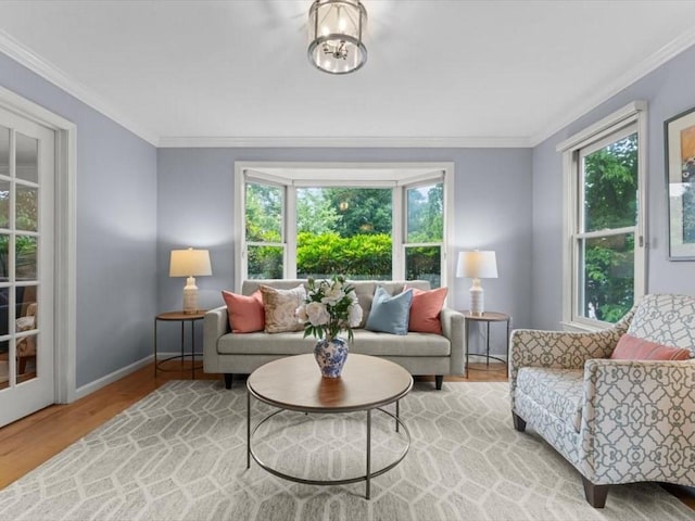 29 Shermans Way, Westwood, MA 02090 - living room with plenty of natural light, light wood-type flooring, crown molding, and a chandelier