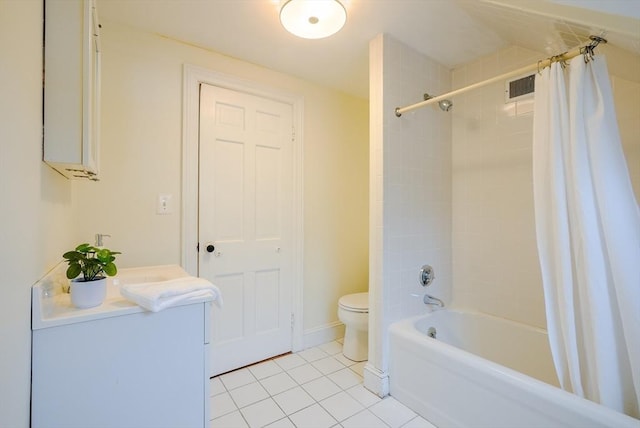 full bathroom featuring tile patterned floors, toilet, vanity, and shower / bath combo