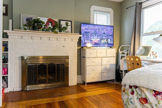 58-60 Virginia St, Springfield, MA 01108 - bedroom with a fireplace and wood finished floors