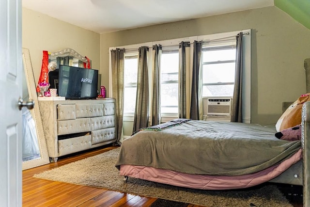 58-60 Virginia St, Springfield, MA 01108 - bedroom featuring wood finished floors, cooling unit, and multiple windows
