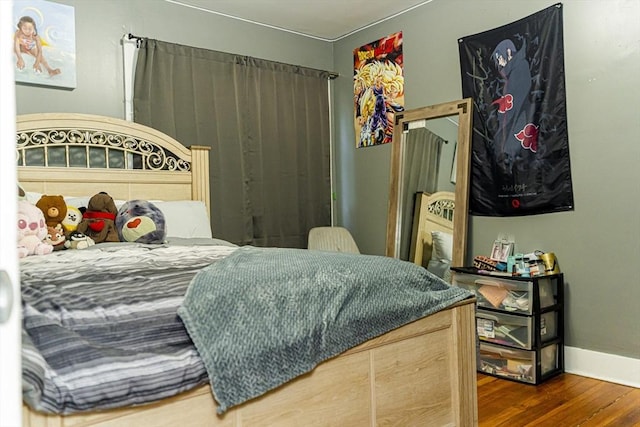 58-60 Virginia St, Springfield, MA 01108 - bedroom with wood finished floors and baseboards