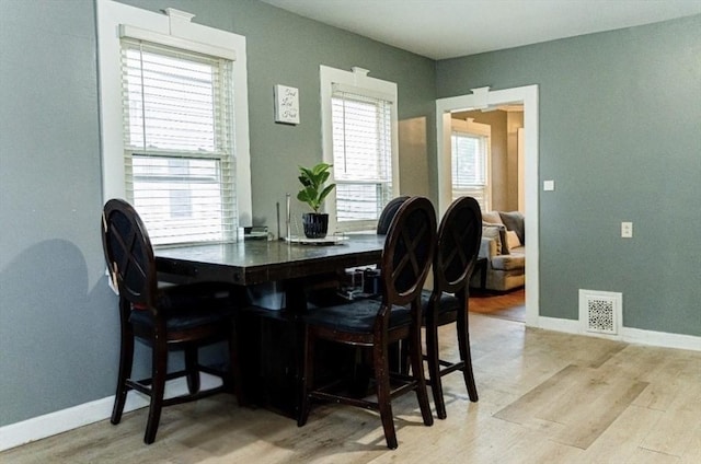 58-60 Virginia St, Springfield, MA 01108 - dining space featuring light wood finished floors and baseboards