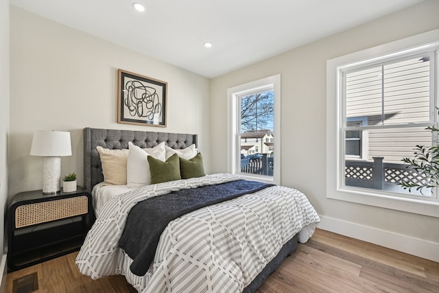 bedroom featuring hardwood / wood-style floors