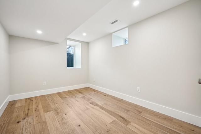 basement with light wood-type flooring