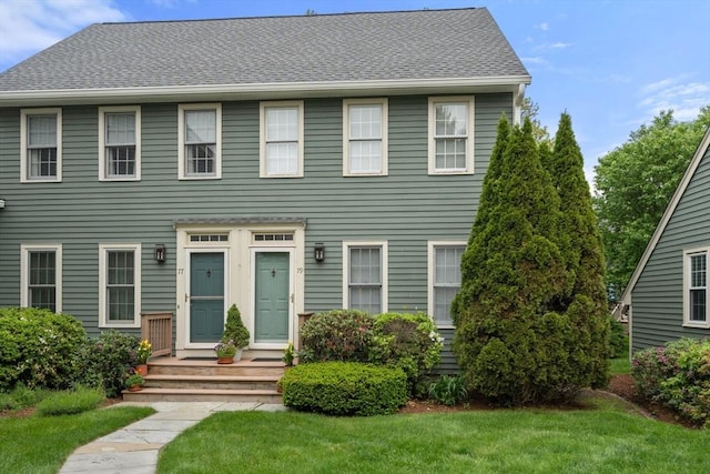 79 Brookdale Cir Unit 79, Shrewsbury, MA 01545 - view of front of house featuring a front lawn and roof with shingles