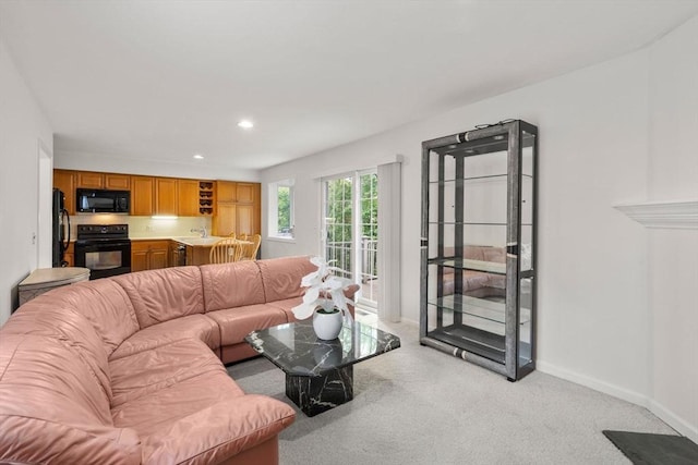 79 Brookdale Cir Unit 79, Shrewsbury, MA 01545 - living room featuring light carpet, recessed lighting, and baseboards