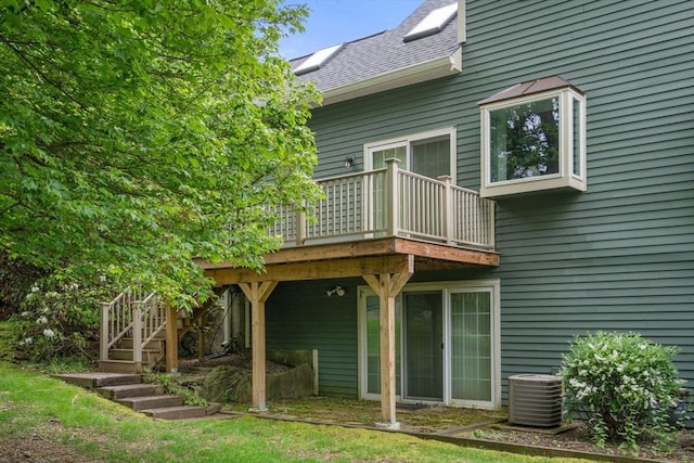 79 Brookdale Cir Unit 79, Shrewsbury, MA 01545 - back of house with cooling unit, a wooden deck, a shingled roof, and stairway