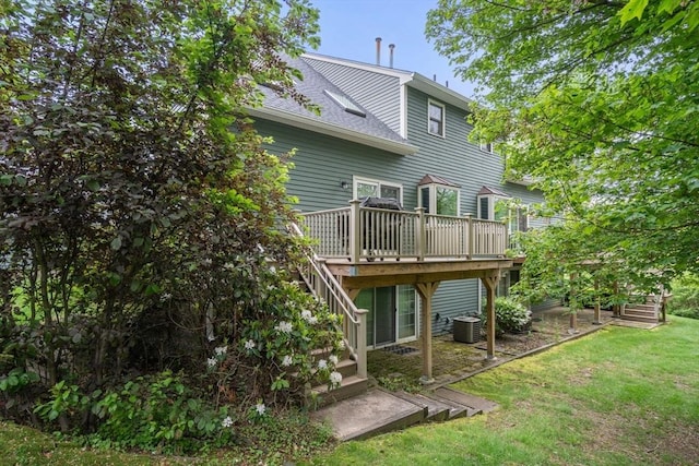 79 Brookdale Cir Unit 79, Shrewsbury, MA 01545 - rear view of property with stairway, a wooden deck, cooling unit, a lawn, and a shingled roof