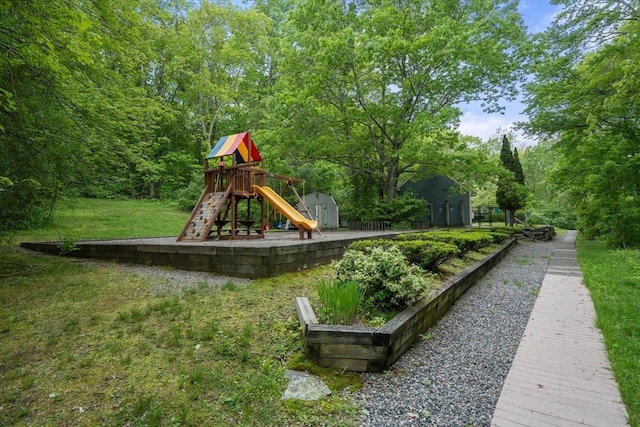 79 Brookdale Cir Unit 79, Shrewsbury, MA 01545 - view of playground featuring a lawn and a shed