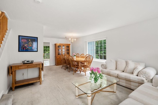 79 Brookdale Cir Unit 79, Shrewsbury, MA 01545 - living area featuring a chandelier, light colored carpet, and stairs