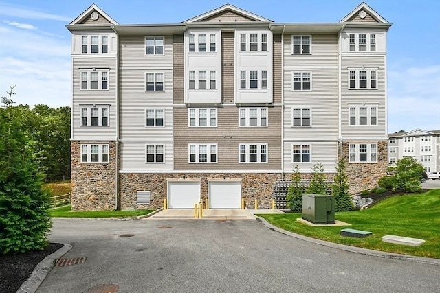 view of building exterior featuring a garage