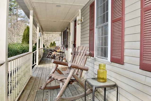 wooden deck with a porch