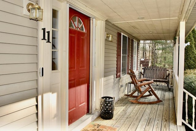 doorway to property with a porch