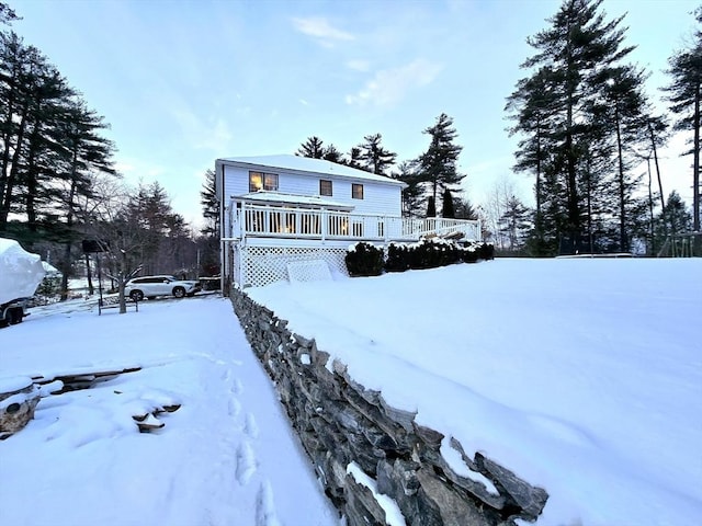 view of front of property featuring a wooden deck