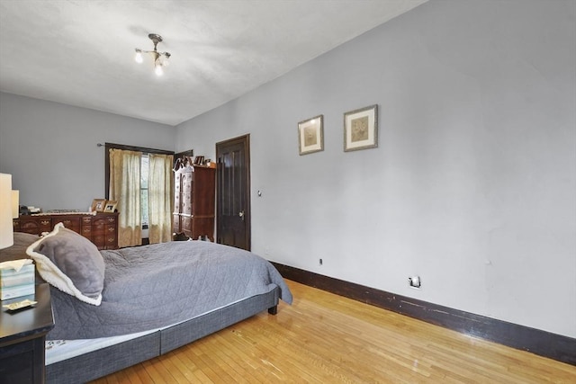 97 Livingston Ave, Lowell, MA 01851 - bedroom featuring baseboards and wood finished floors