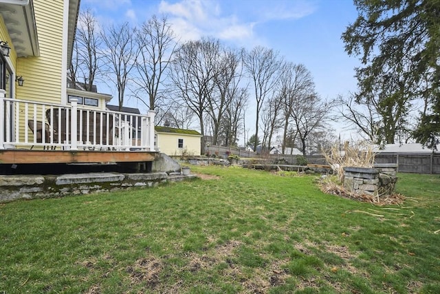 97 Livingston Ave, Lowell, MA 01851 - view of yard with a wooden deck and fence