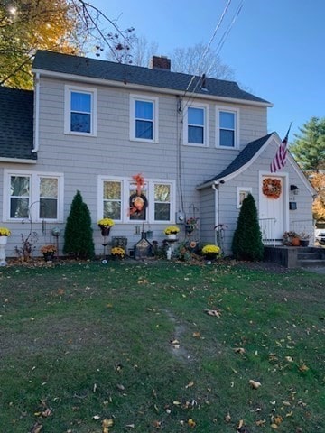 view of front of house with a front yard