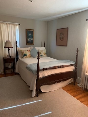 bedroom featuring hardwood / wood-style floors