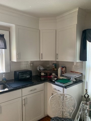 kitchen with white cabinetry