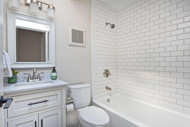 full bathroom featuring toilet, shower / tub combination, visible vents, and vanity