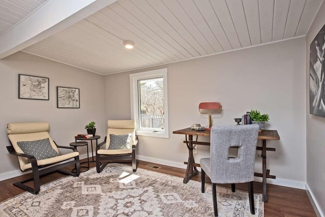 sitting room with lofted ceiling with beams, wooden ceiling, wood finished floors, and baseboards