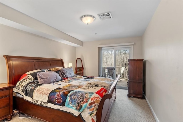 bedroom with light colored carpet