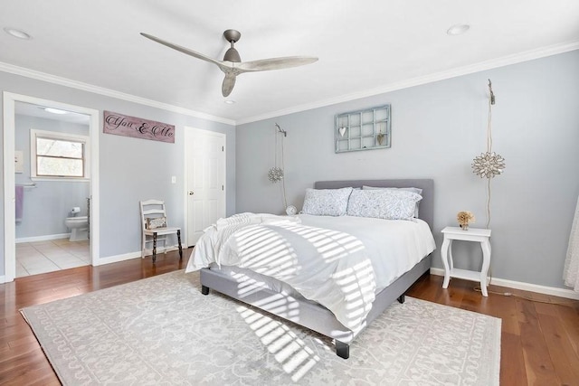bedroom featuring baseboards, ornamental molding, a ceiling fan, and wood finished floors