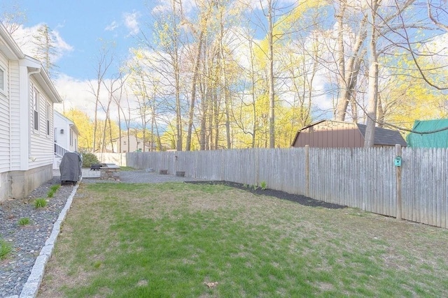 view of yard featuring a fenced backyard