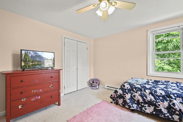 24 Lynn Ln, Southbridge, MA 01550 - carpeted bedroom featuring a closet, a baseboard radiator, and a ceiling fan