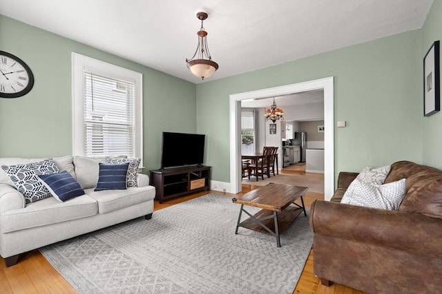 12 Summit Ave Unit 1, Salem, MA 01970 - living area with a chandelier and wood finished floors