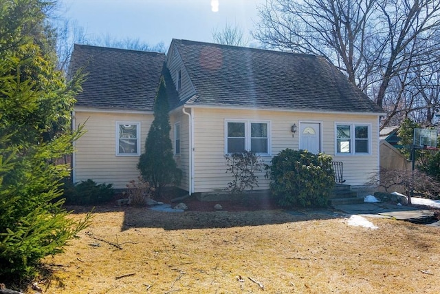 view of front of house with roof with shingles