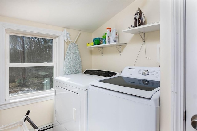 washroom with laundry area and washer and clothes dryer