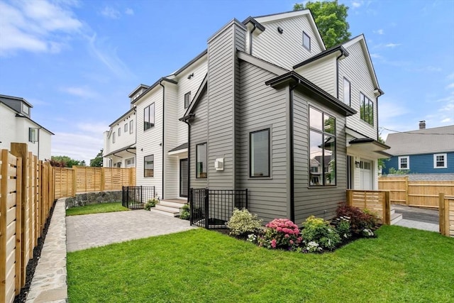 25 Johnson Pl Unit 25, Newton, MA 02466 - back of house with a patio area and a fenced backyard