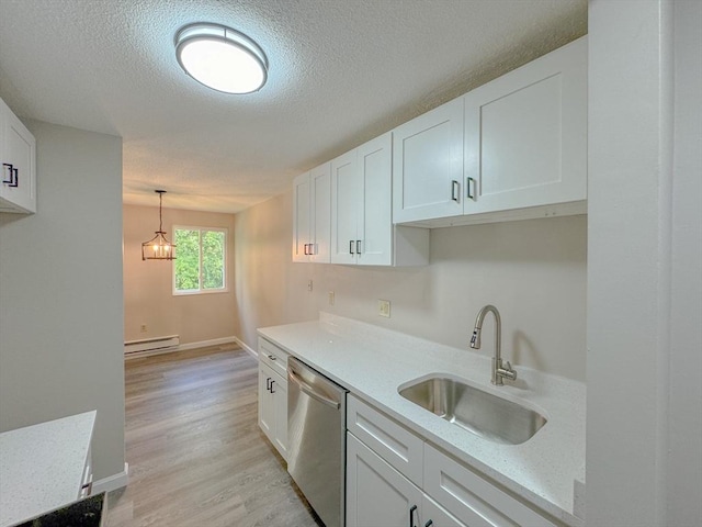 kitchen with white cabinetry, a sink, a baseboard heating unit, and stainless steel dishwasher