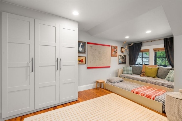 332 Eliot St, Milton, MA 02186 - living area with light wood-style flooring and recessed lighting