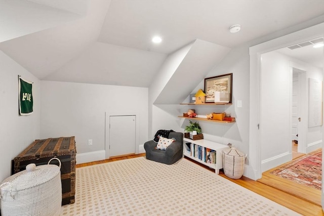 332 Eliot St, Milton, MA 02186 - sitting room with wood finished floors and lofted ceiling