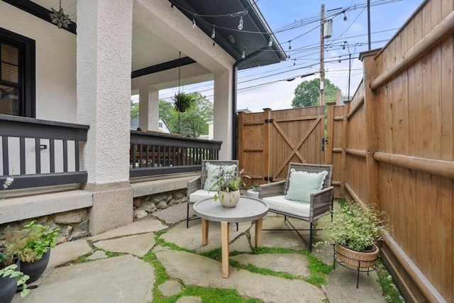332 Eliot St, Milton, MA 02186 - view of patio / terrace featuring a gate