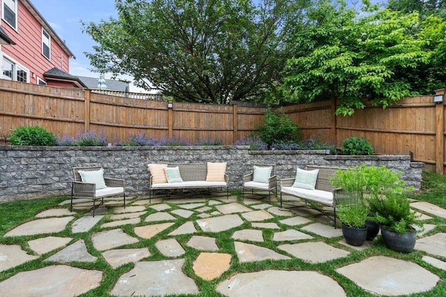 332 Eliot St, Milton, MA 02186 - fenced backyard featuring a patio area