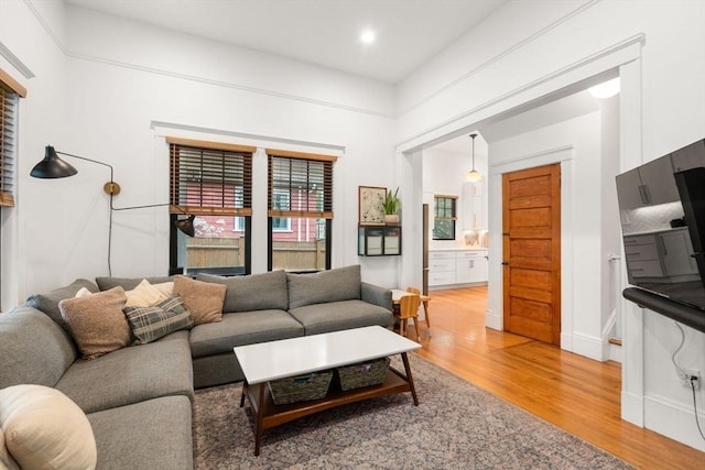 332 Eliot St, Milton, MA 02186 - living room with light wood-style flooring and recessed lighting