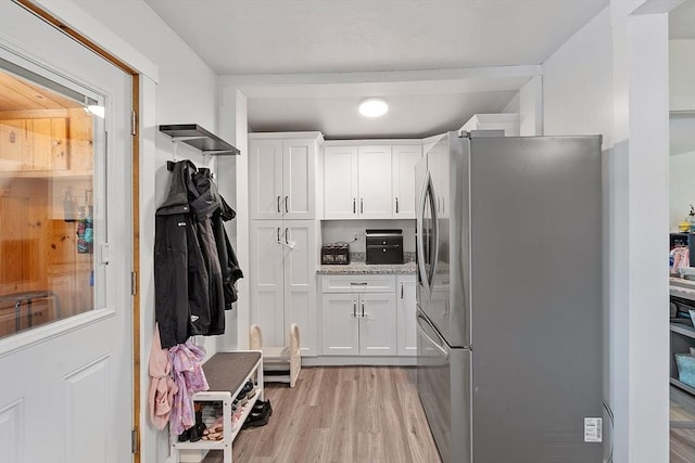 mudroom featuring light wood-style flooring